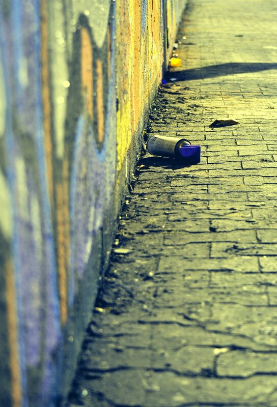 spray can on a sidewalk