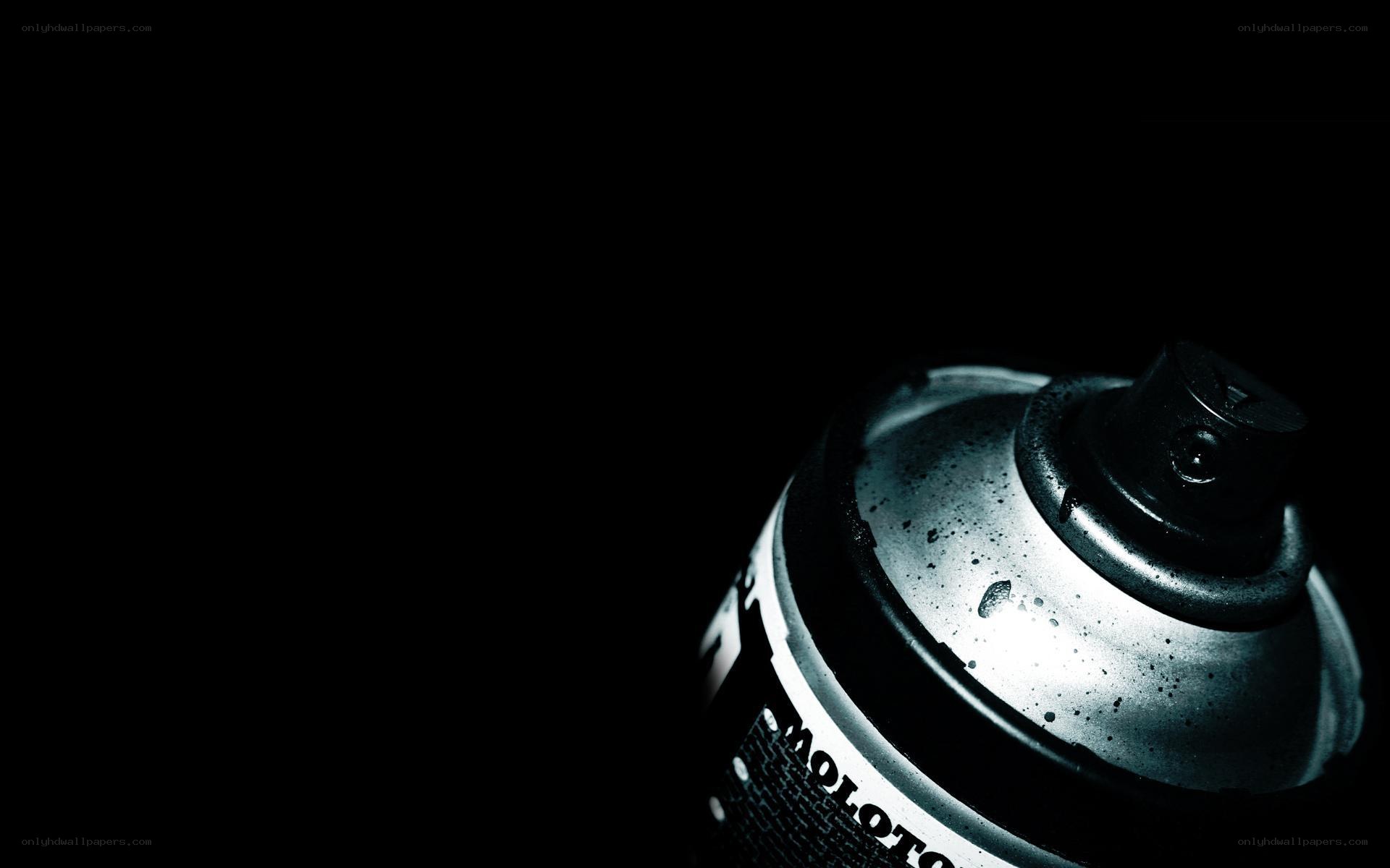 spray paint can in darkness