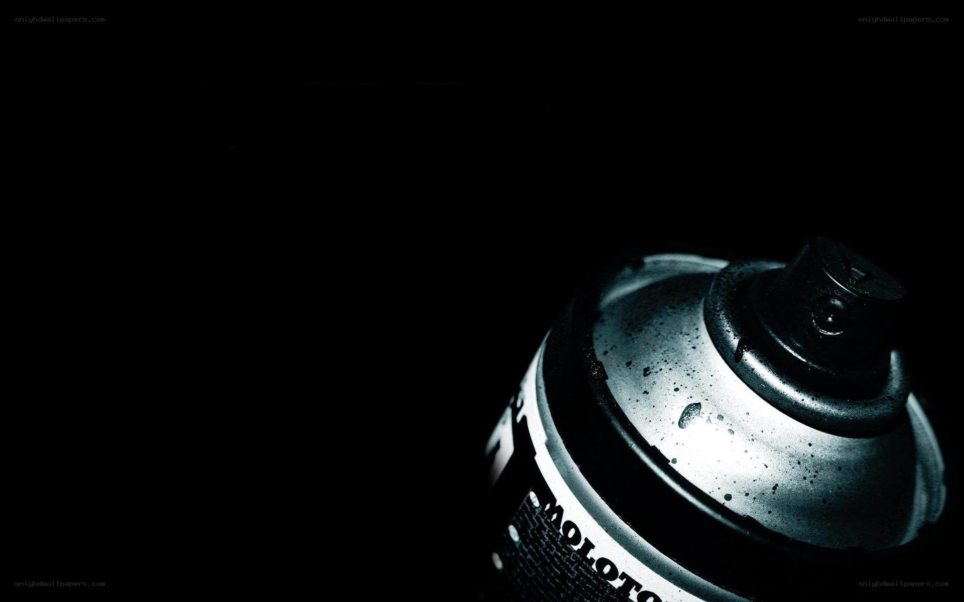 spray paint can in darkness