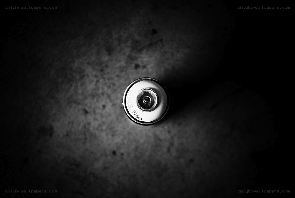 spray paint can on concrete