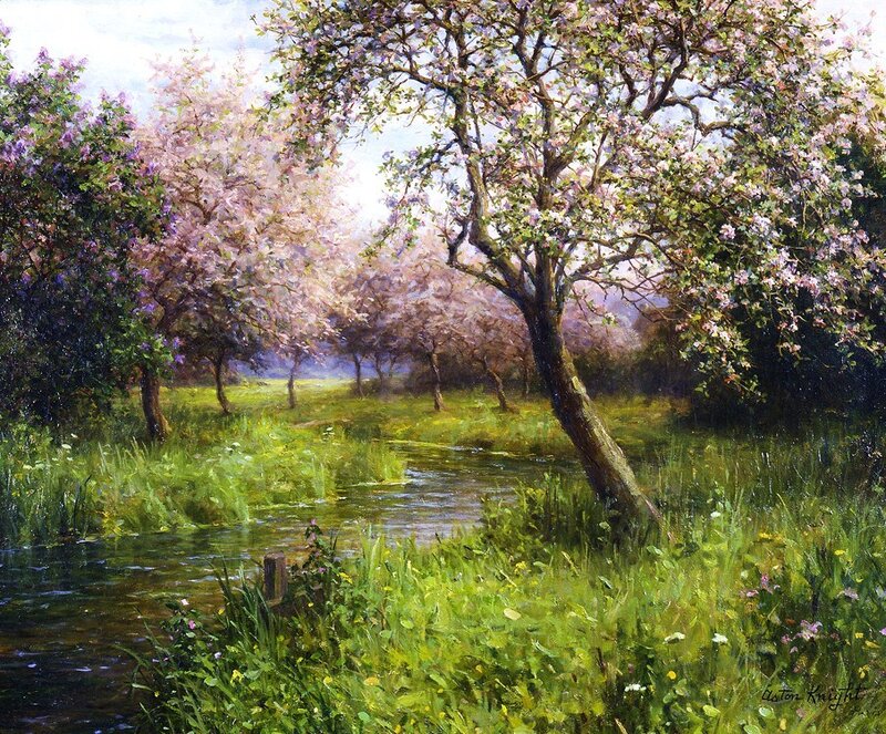 Spring orchard by a stream