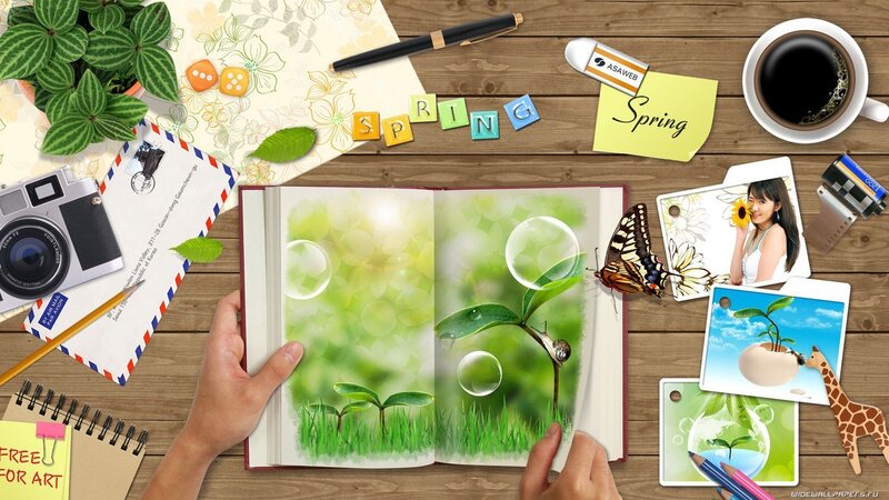 Spring-themed desk with book and photos
