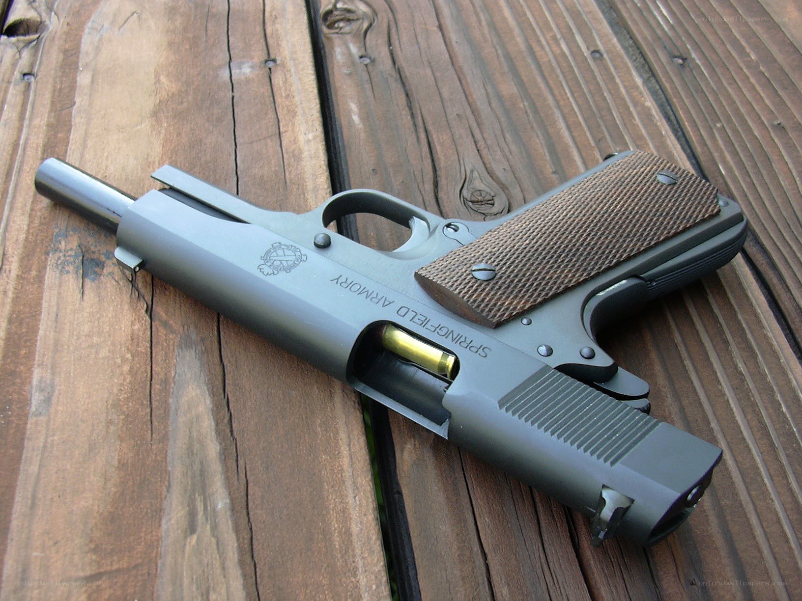 Springfield Armory pistol on wood