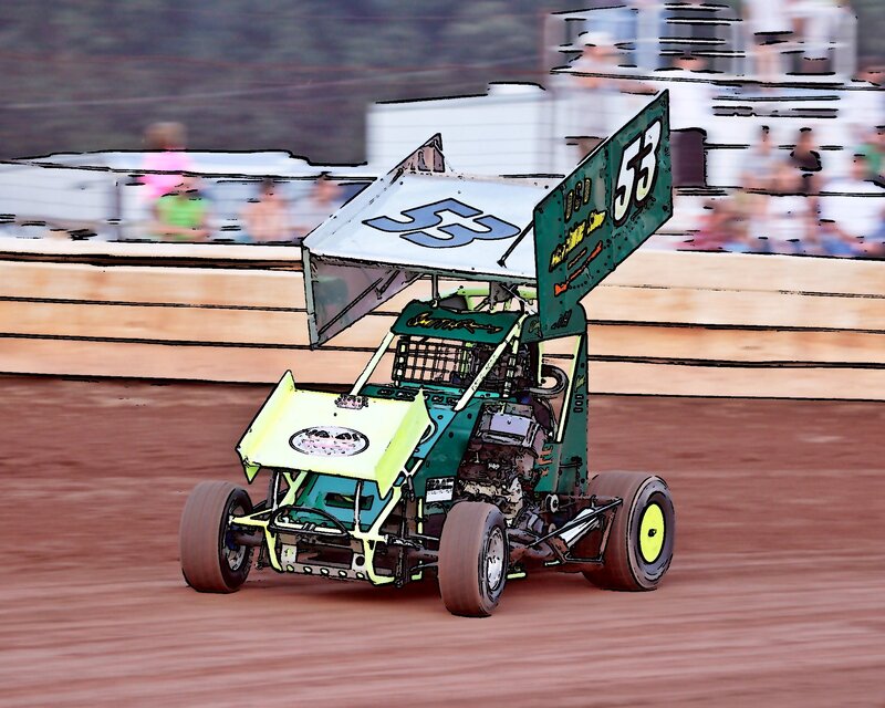 Sprint car racing on dirt track