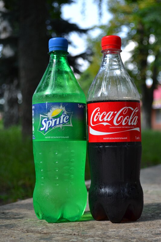 Sprite and Coca-Cola bottles