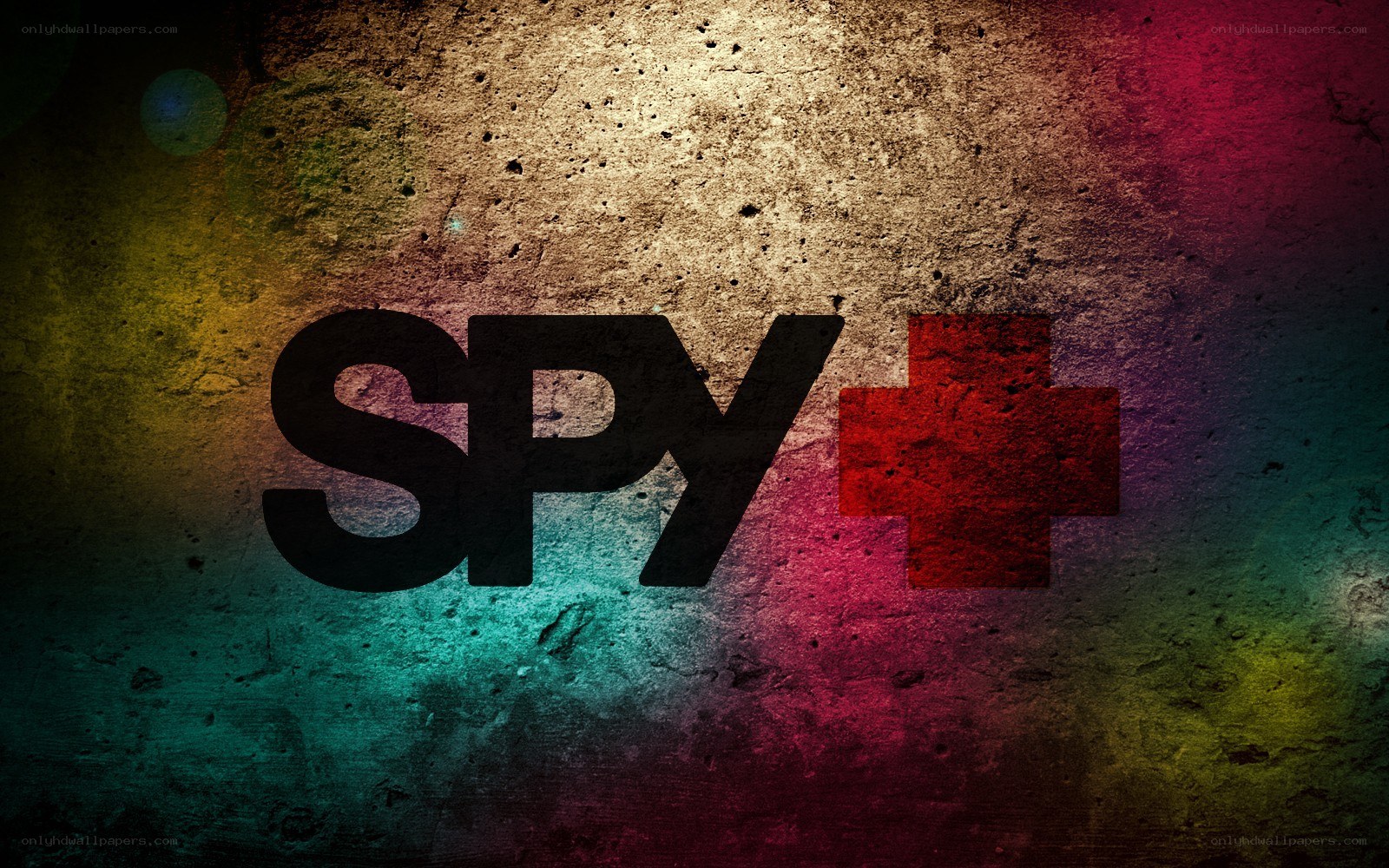 Spy Plus logo on textured wall