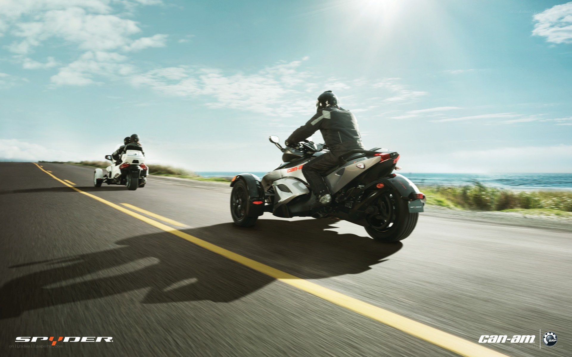 Spyder trikes on coastal road