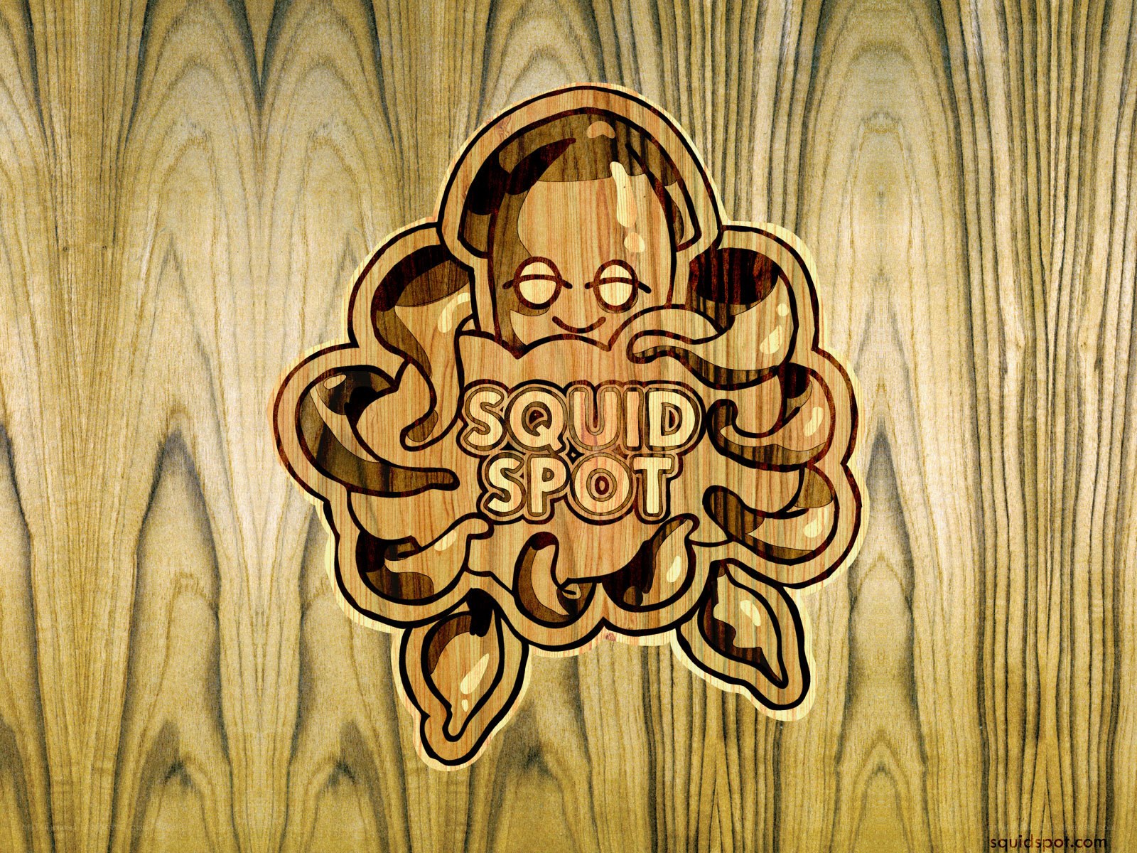 Squid Spot logo on wood