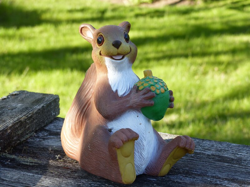 Squirrel Statue Holding Acorn