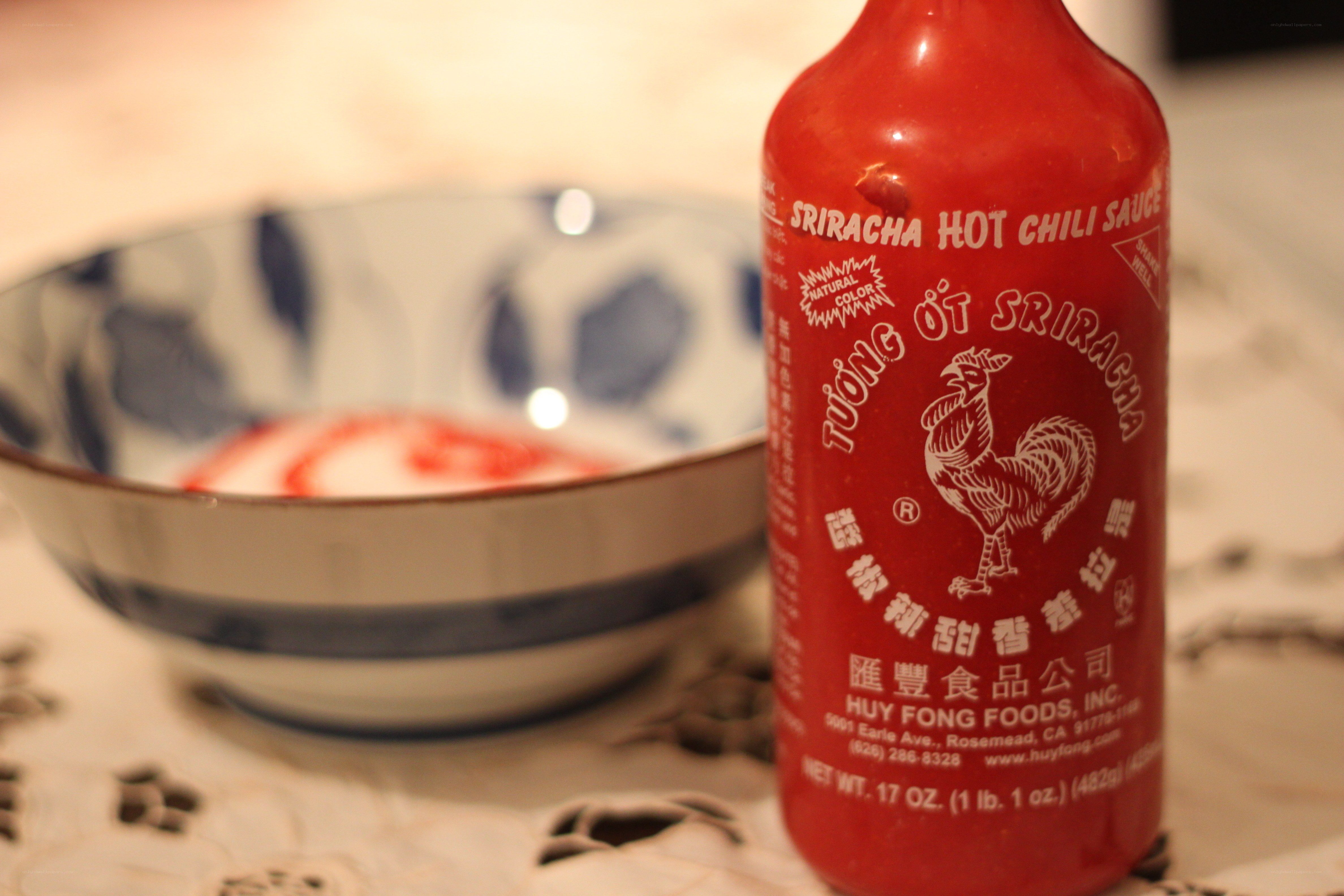 Sriracha bottle and bowl