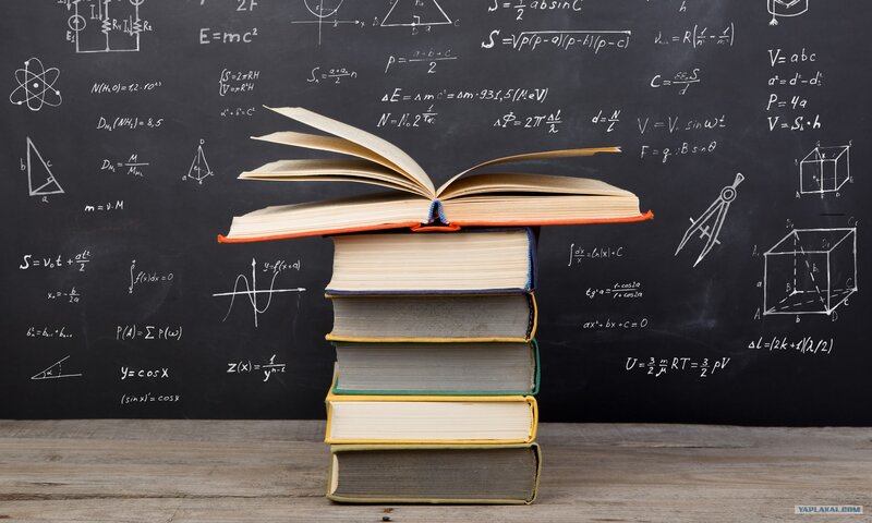 Stack of Books on Chalkboard