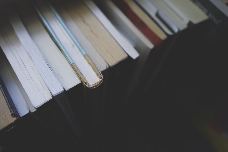 Stack of Books — White
