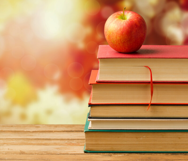 Stack of Books with Apple
