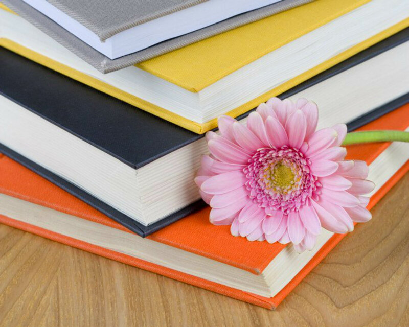Stack of Books with Flower