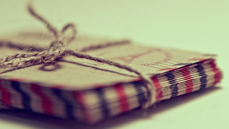 Stack of Cards Tied with String