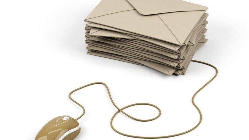 stack of envelopes and mouse