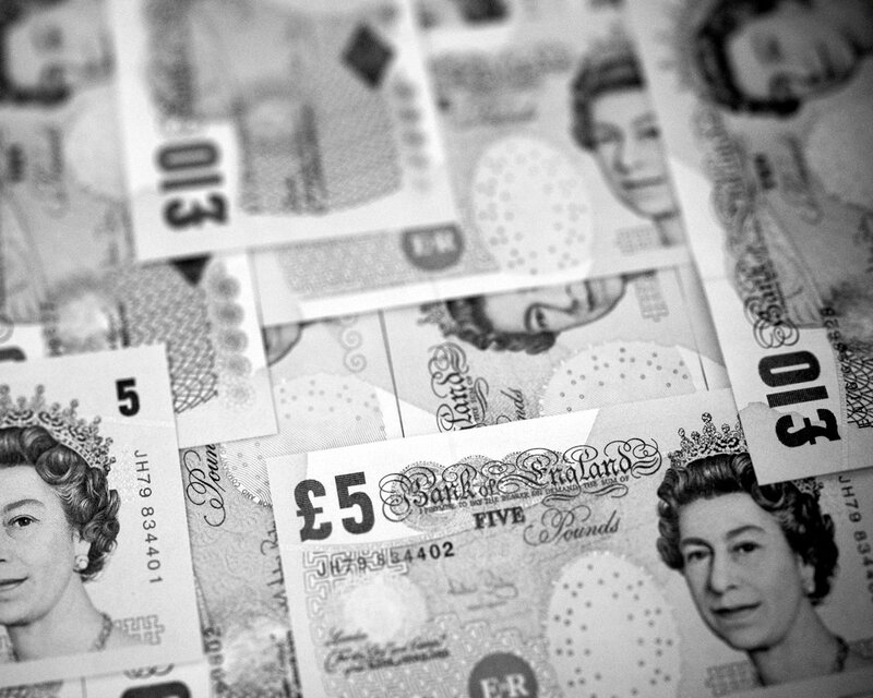stack of five pound notes