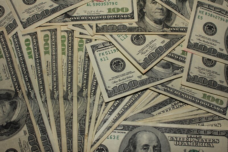 stack of hundred dollar bills