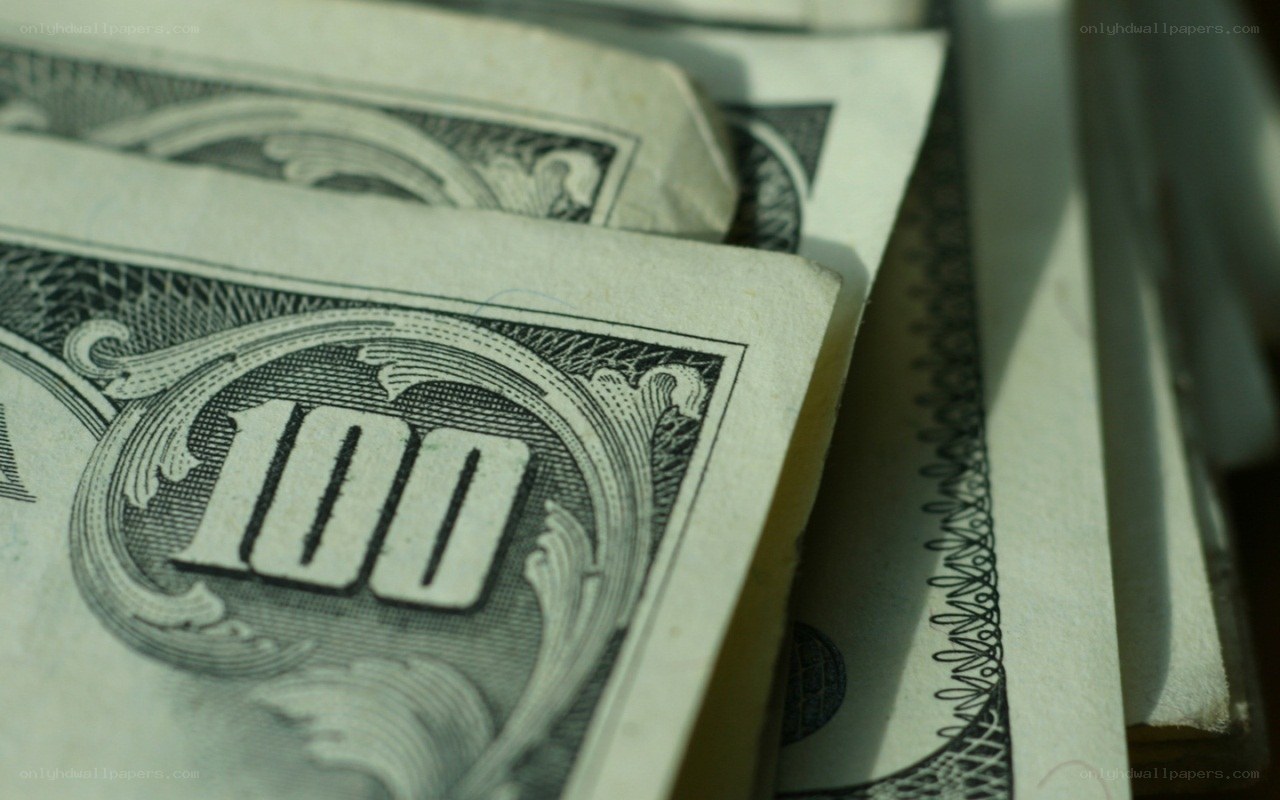 stack of hundred dollar bills