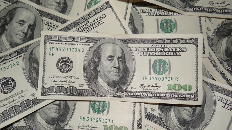 stack of hundred-dollar bills
