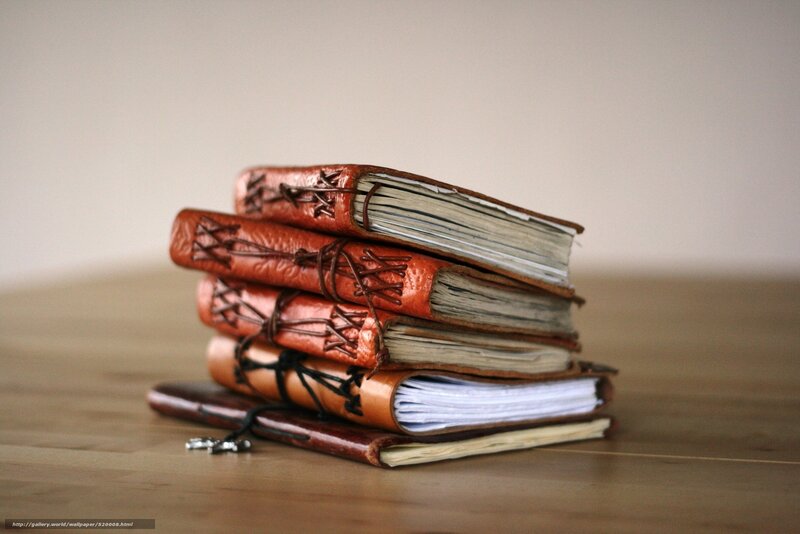 stack of leather journals