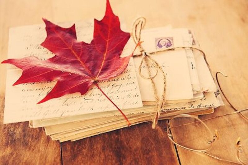 Stack of Letters with Leaf