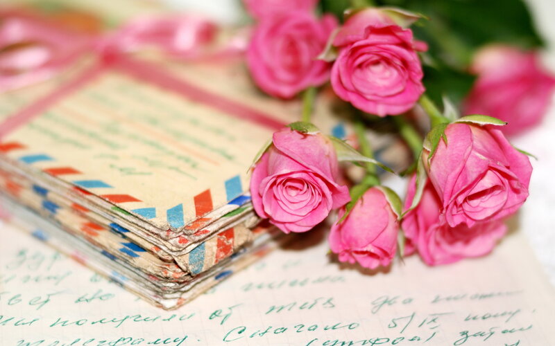 Stack of Letters with Roses