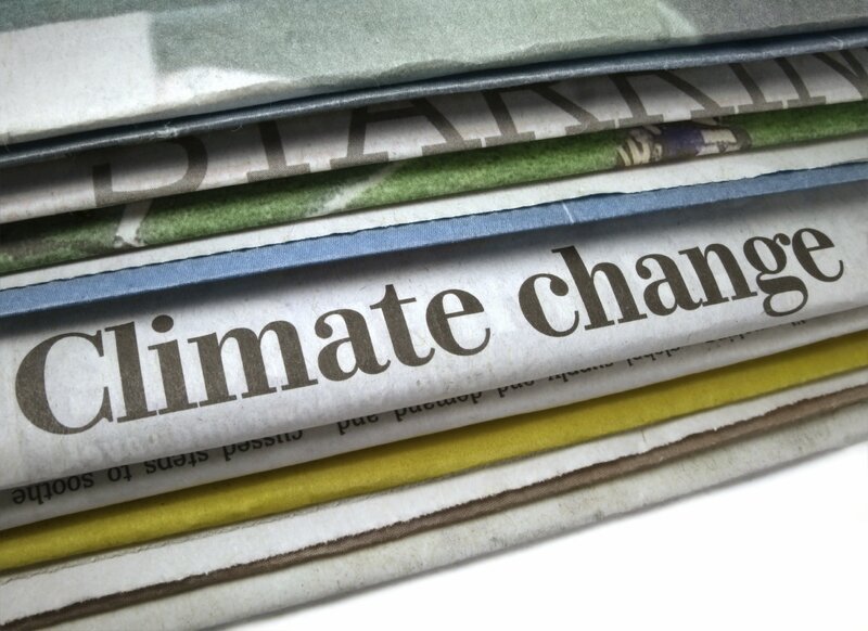 Stack of Newspapers — White