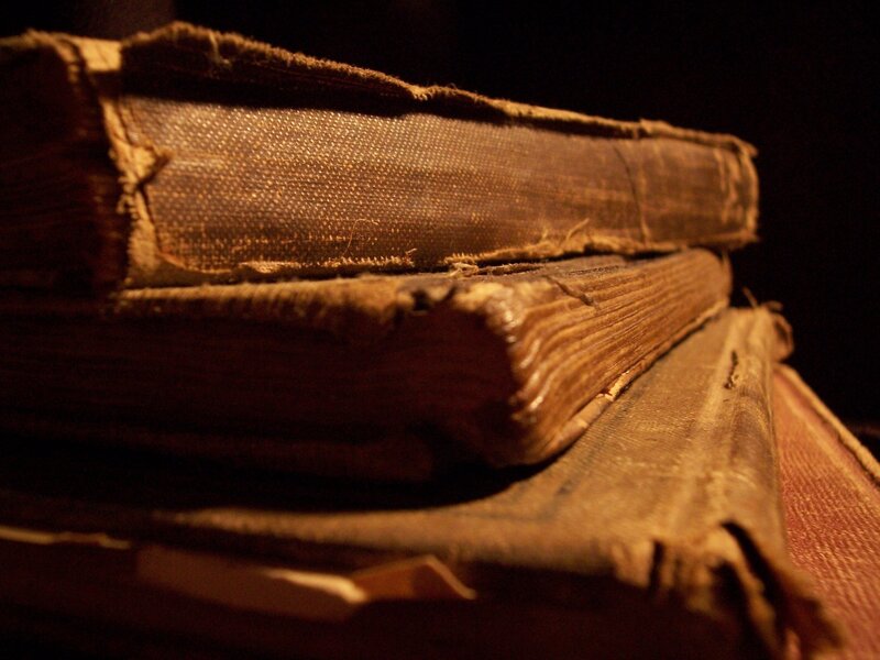 Stack of Old Books — Brown, Dramatic, Photograph, Fabric Covers, Dark Background