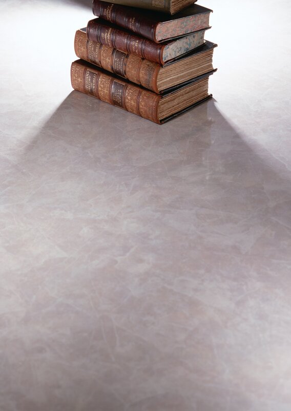 stack of old books on marble