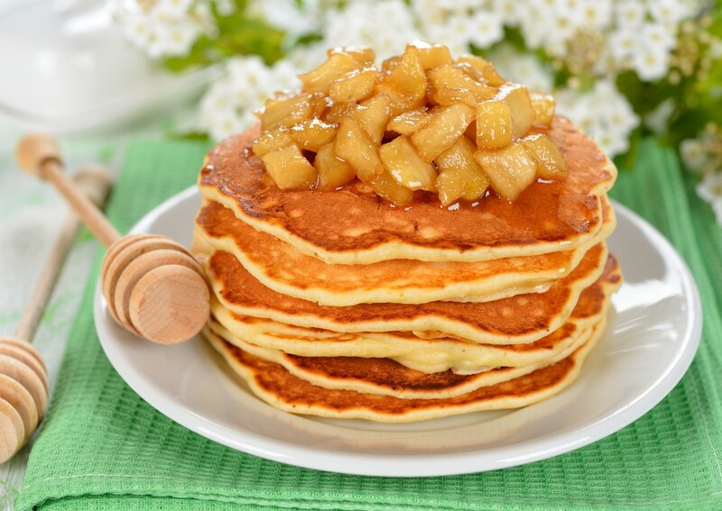 stack of pancakes with apples