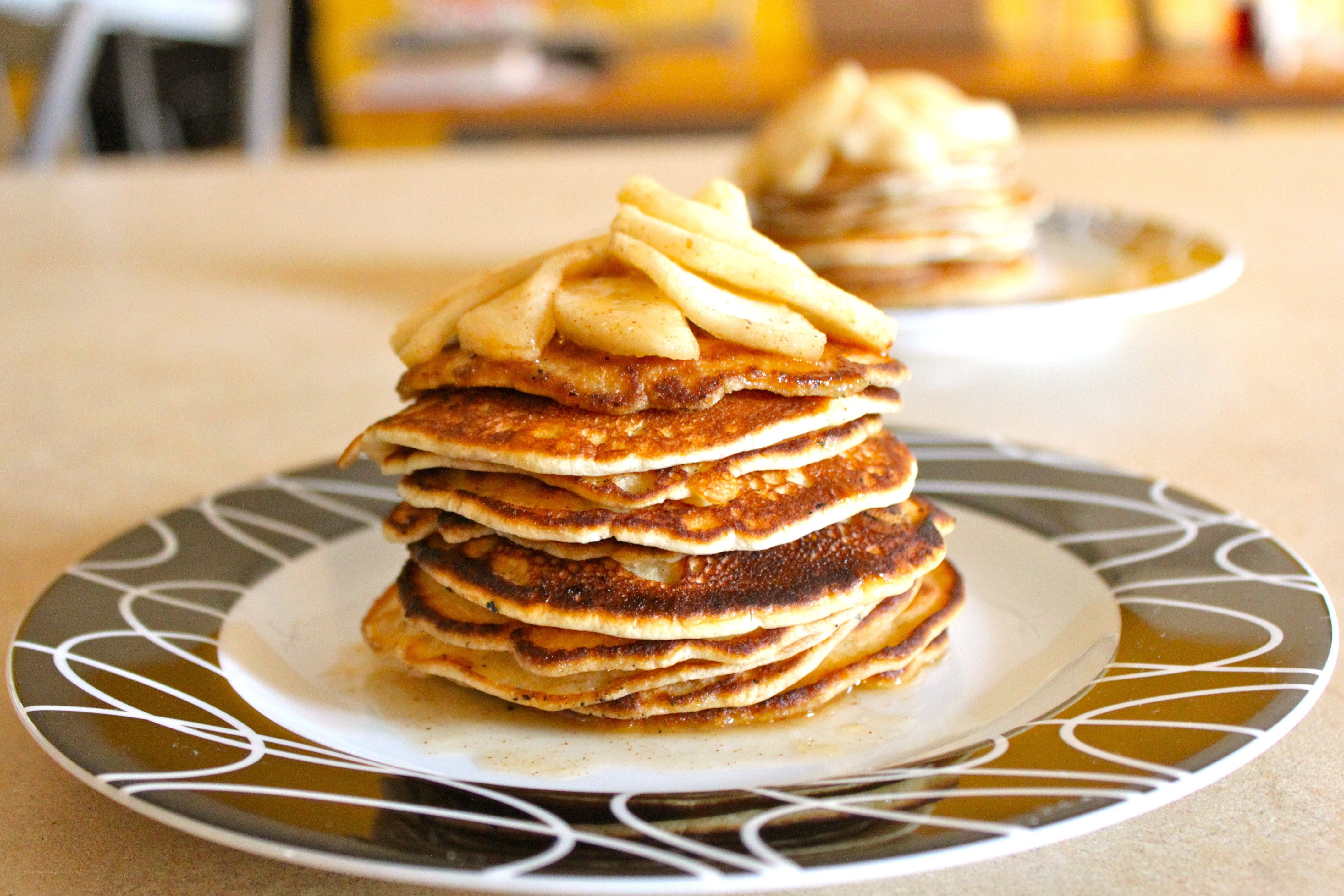 stack of pancakes with bananas