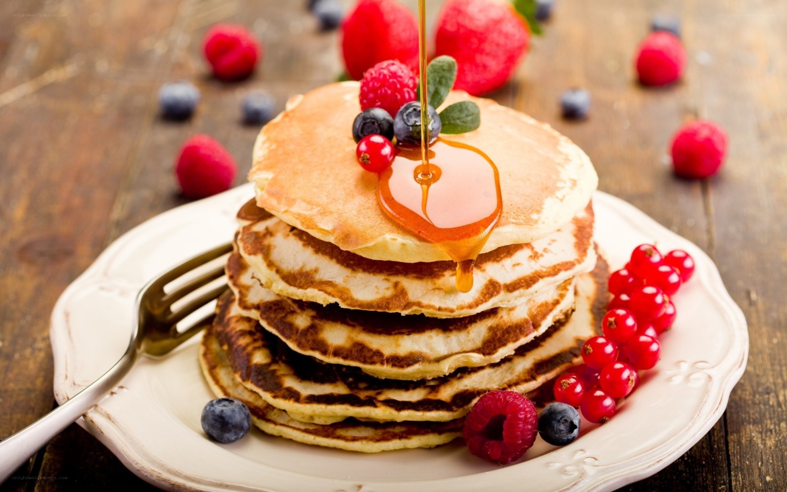 stack of pancakes with berries