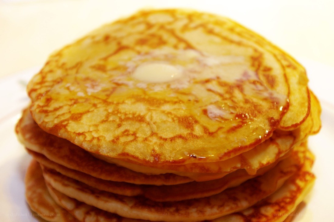 stack of pancakes with butter