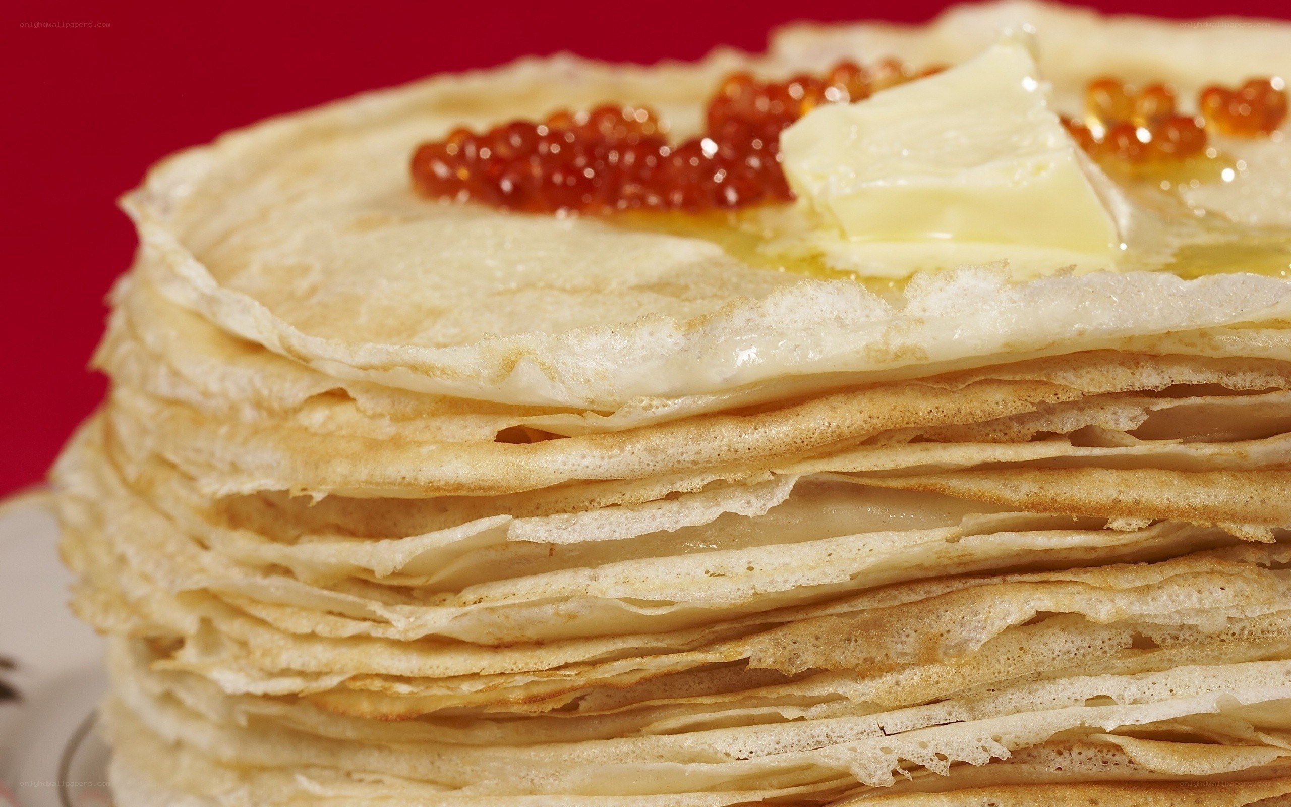 stack of pancakes with caviar