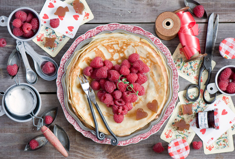Stack of Pancakes with Raspberries — Red