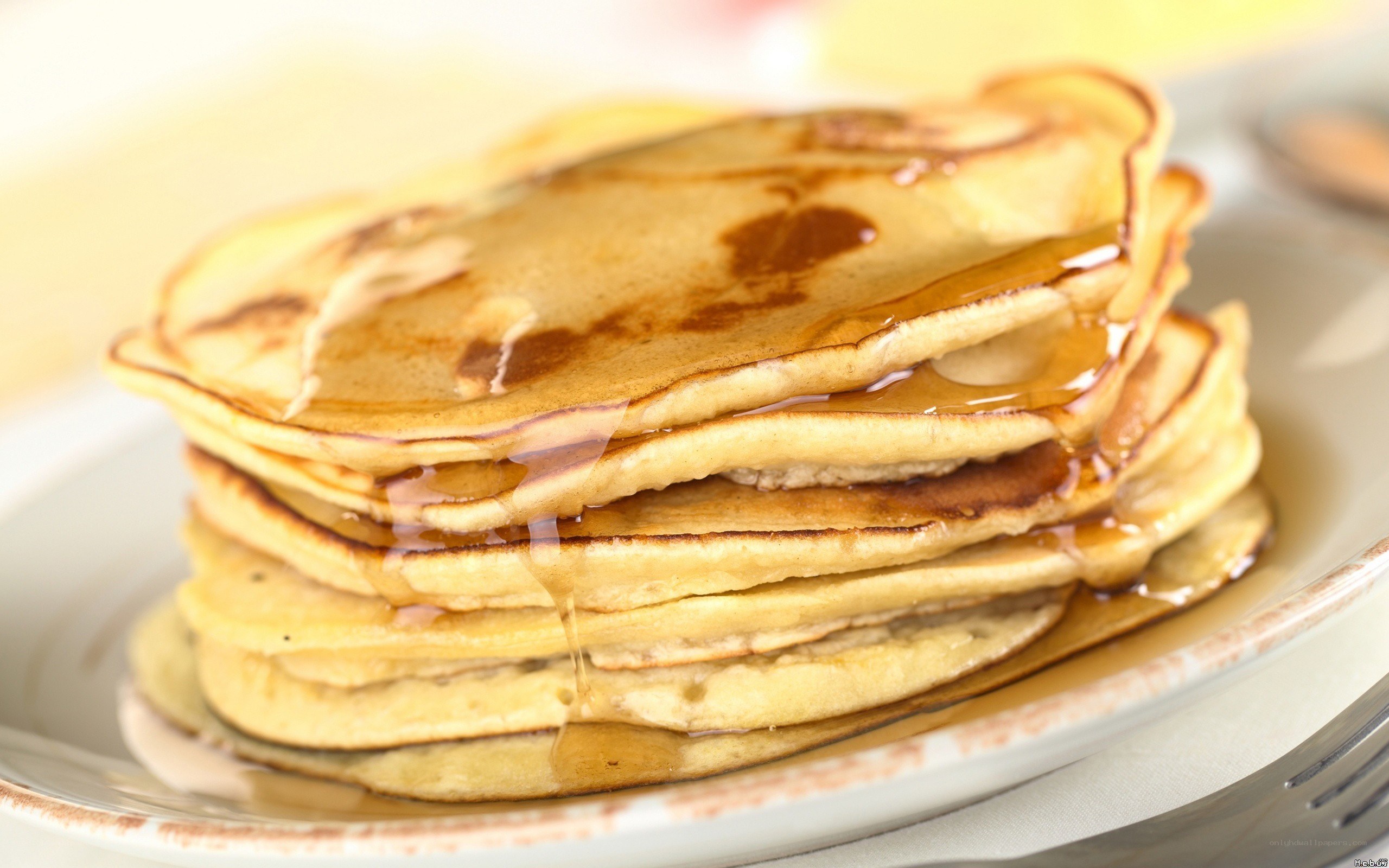 stack of pancakes with syrup