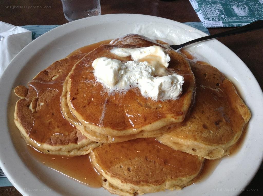 stack of pancakes with syrup