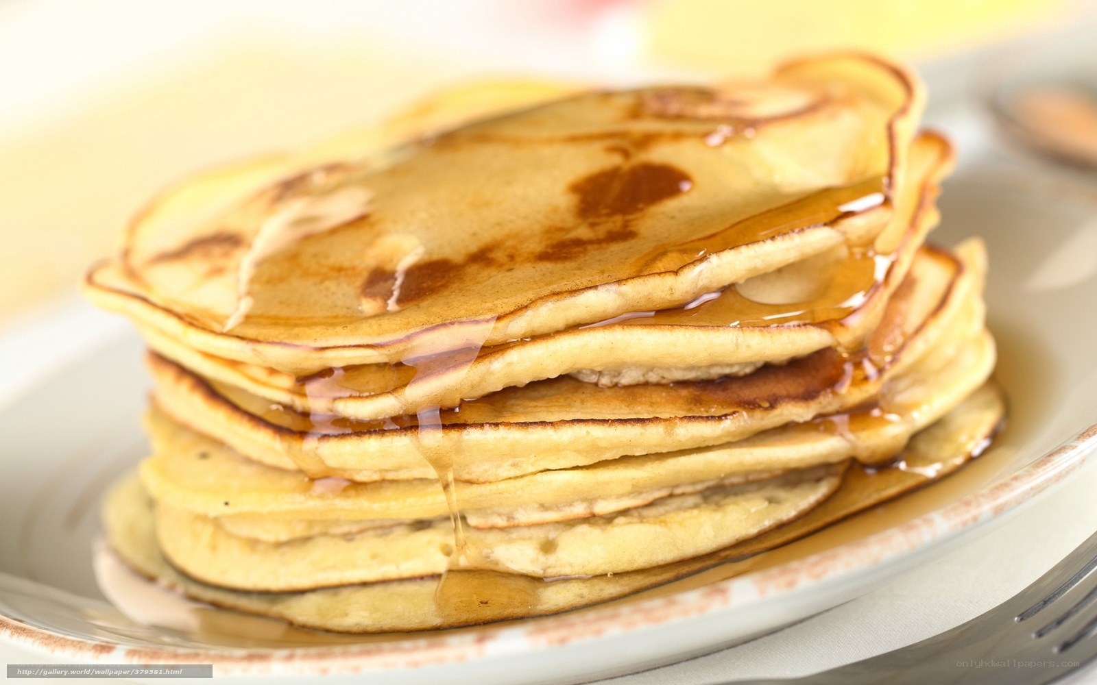 stack of pancakes with syrup