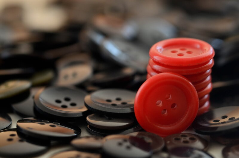 Stack of Red Buttons