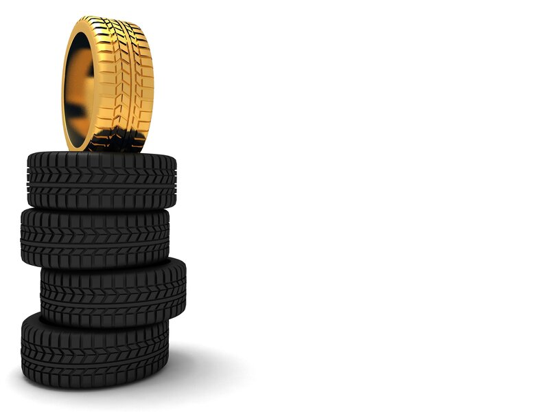 stack of tires with golden tire