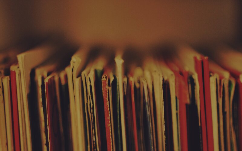 Stack of Vinyl Records — Red