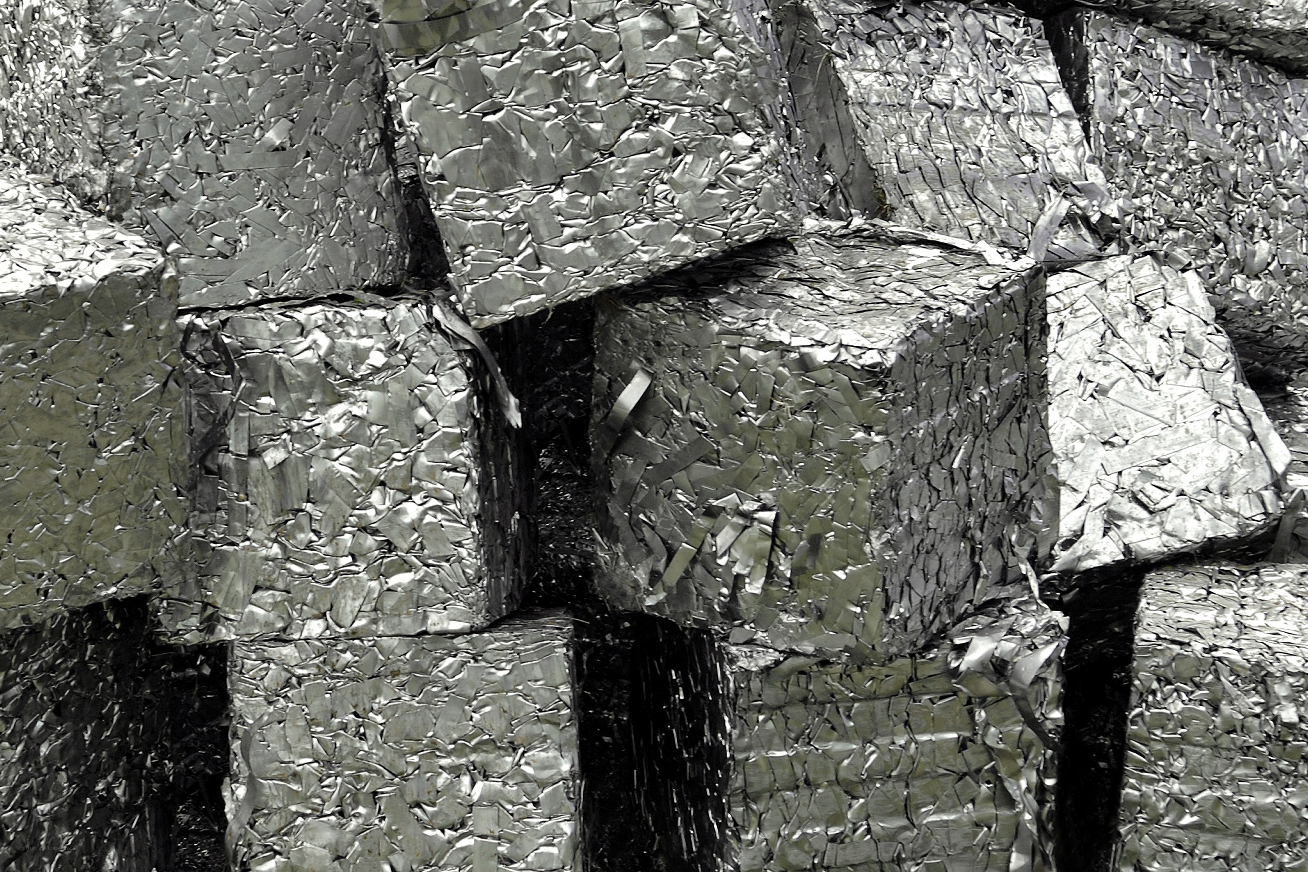stacked aluminum scrap bales
