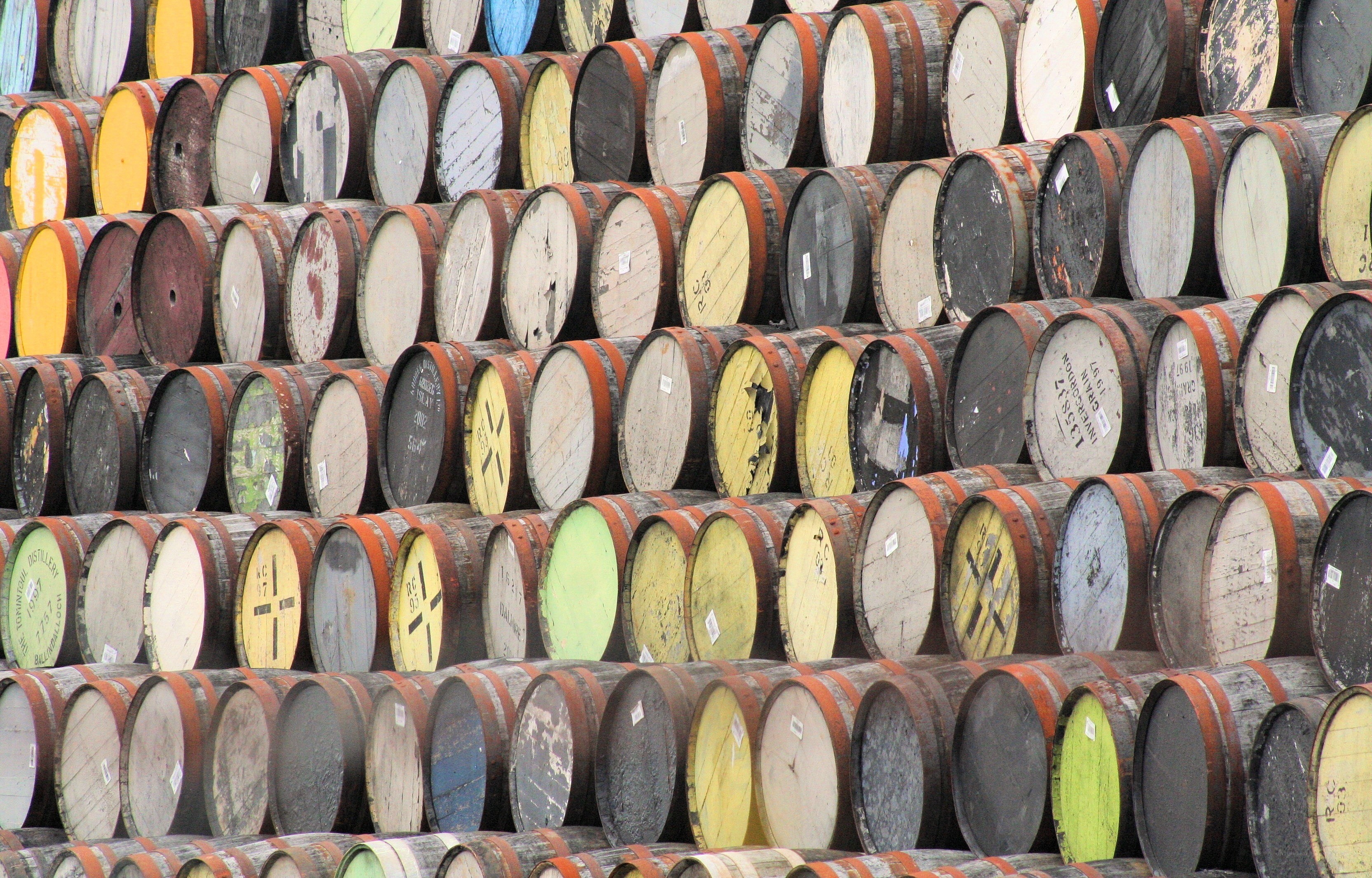 stacked barrels at distillery