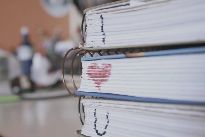 stacked binders with heart