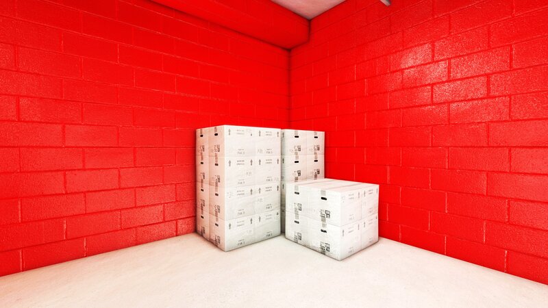 stacked boxes in red room