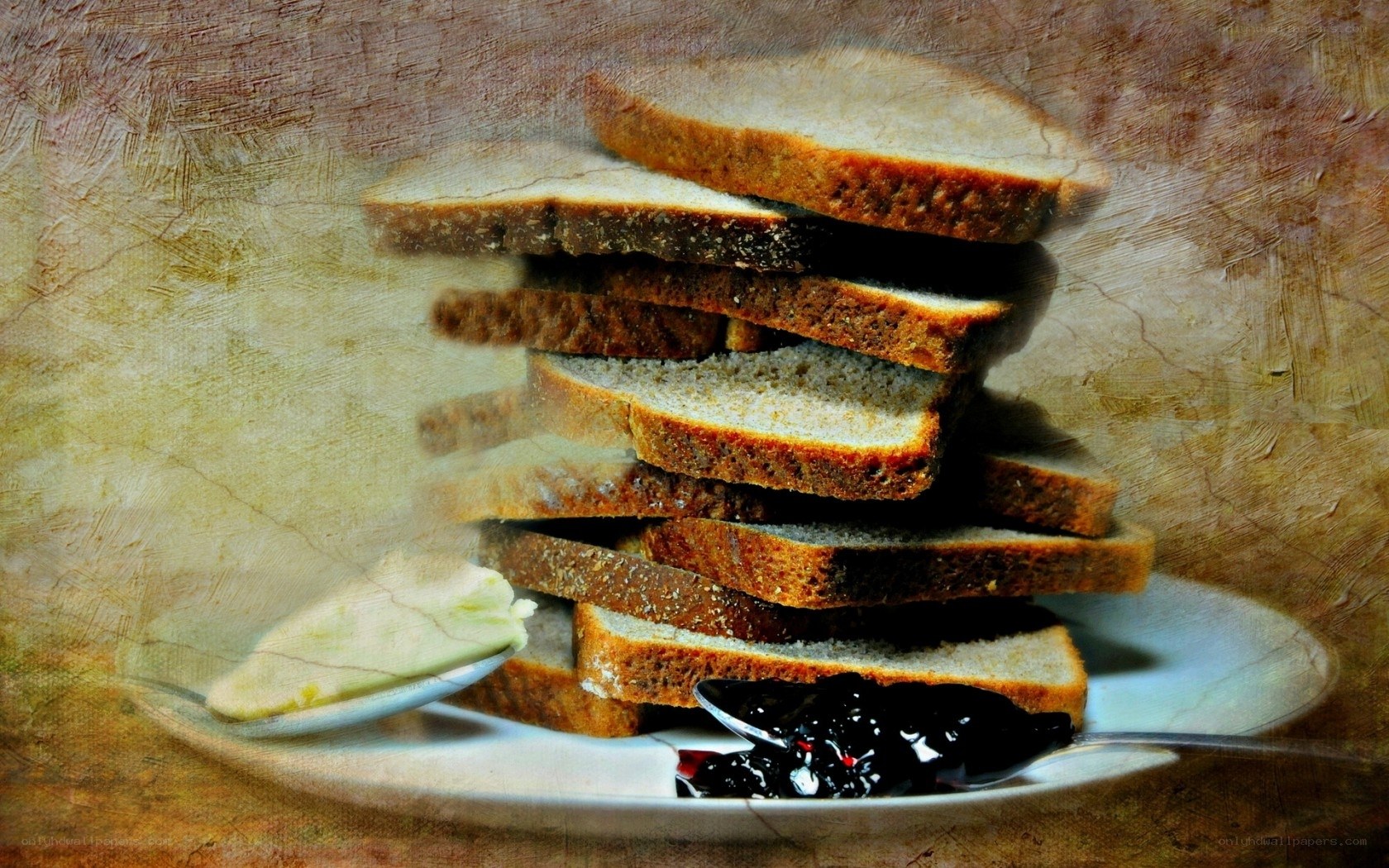 stacked bread slices with jam and butter