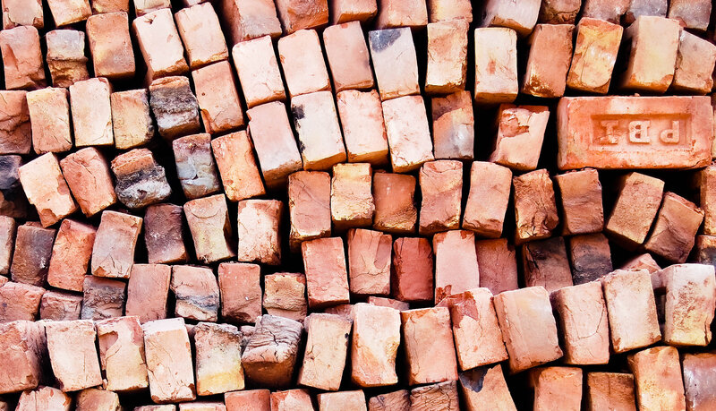 stacked bricks in a pile
