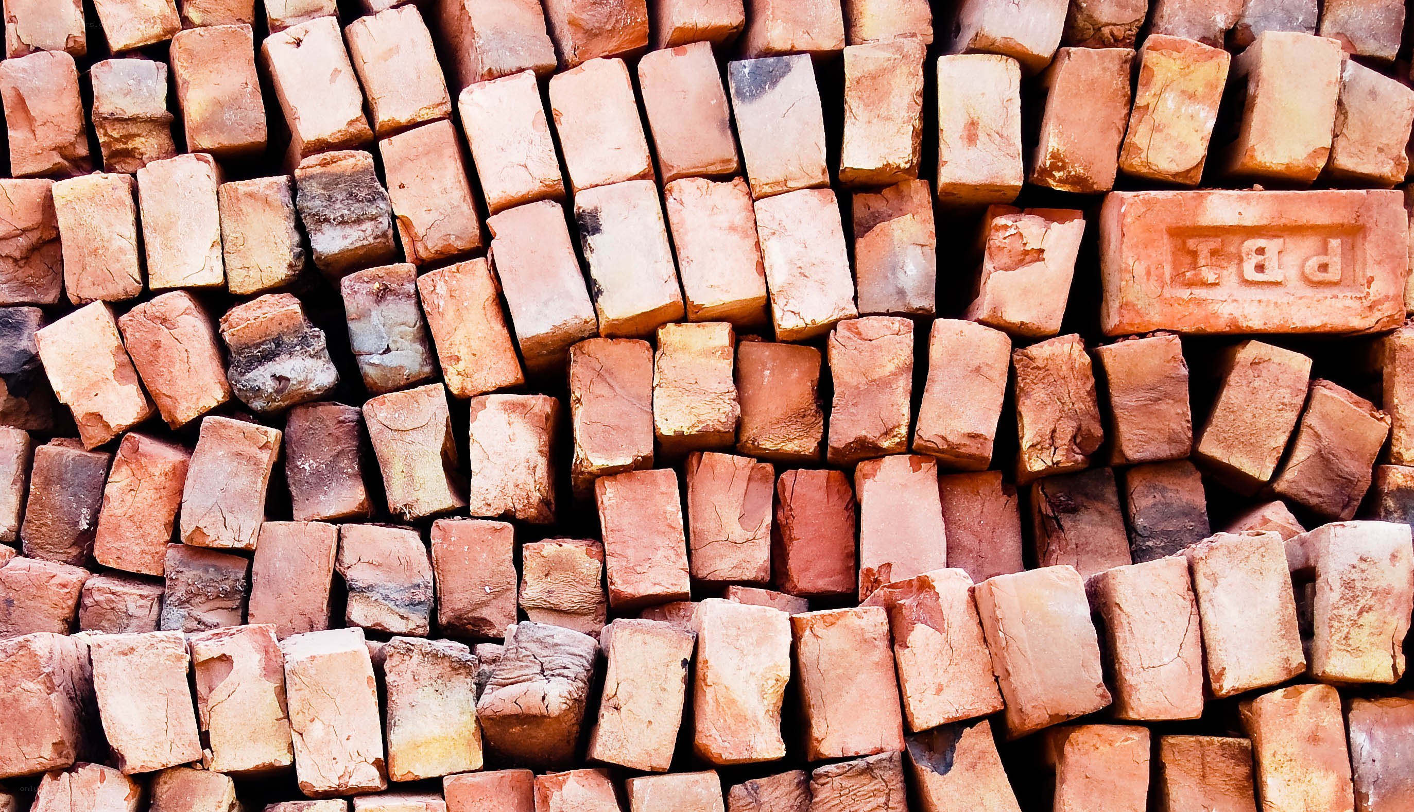 stacked bricks in a pile