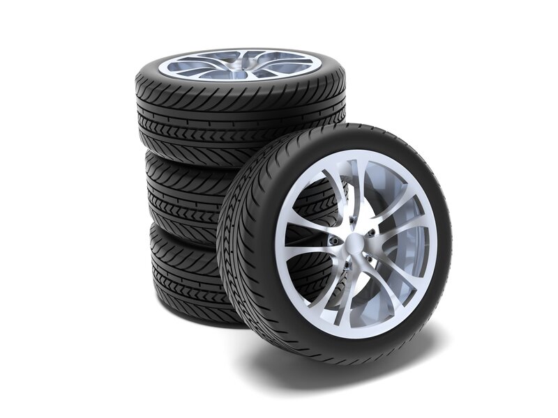 stacked car tires and wheels